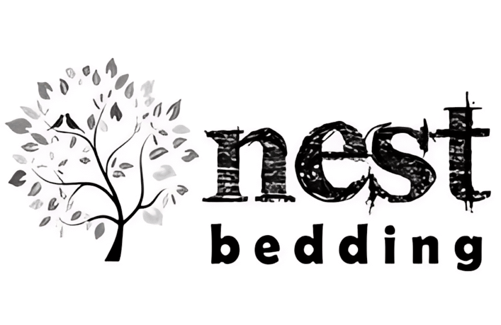 Soft gray and black logo of The Mattress Underground with a stylized tree, emphasizing trusted mattress resources, mattress information, and bedding solutions for better sleep.
