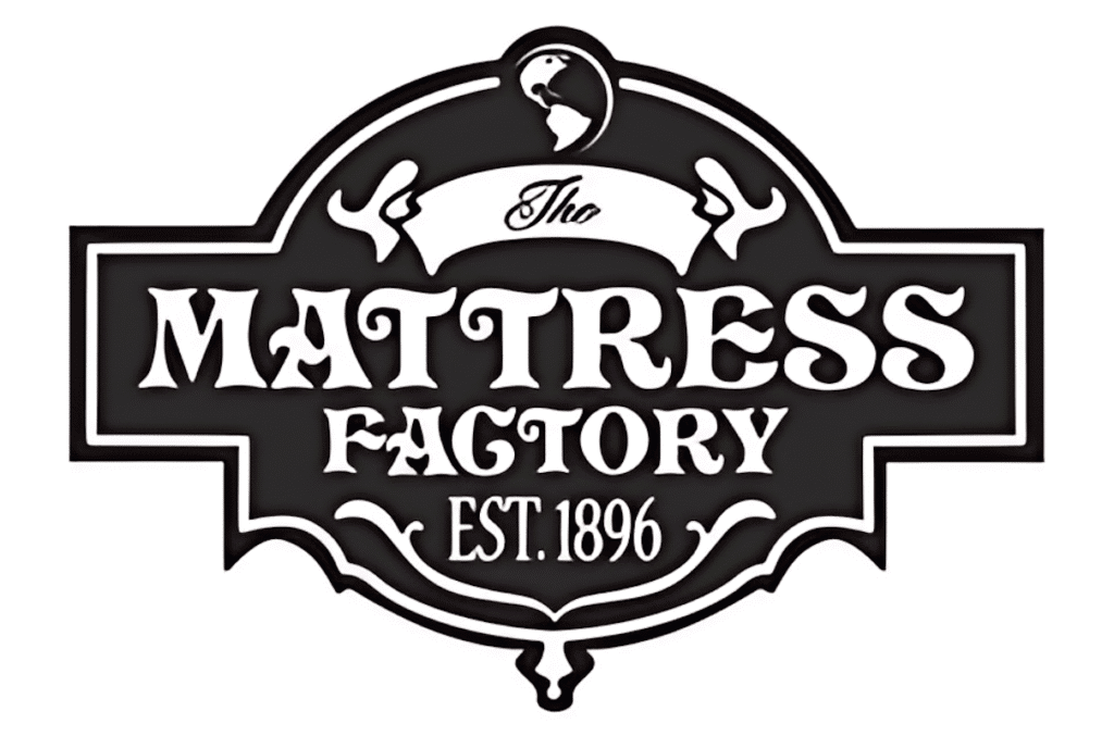 Black and white logo of The Mattress Factory with vintage font and decorative elements, signifying quality mattress craftsmanship since 1896.