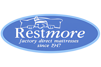 Restmore mattress factory logo with a person soundly sleeping on a bed, emphasizing quality handmade mattresses since 1947.